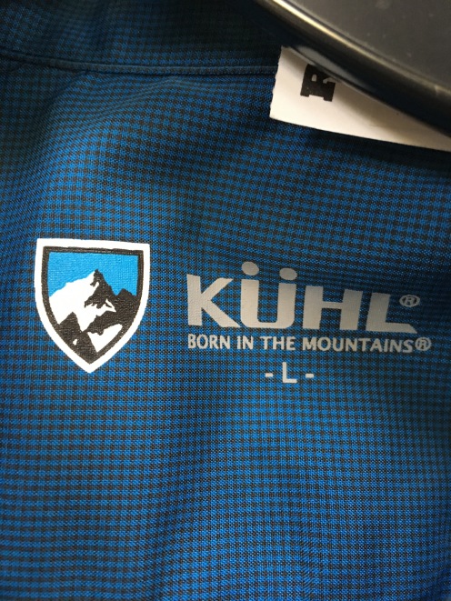 Kuhl label on snap button shirt
